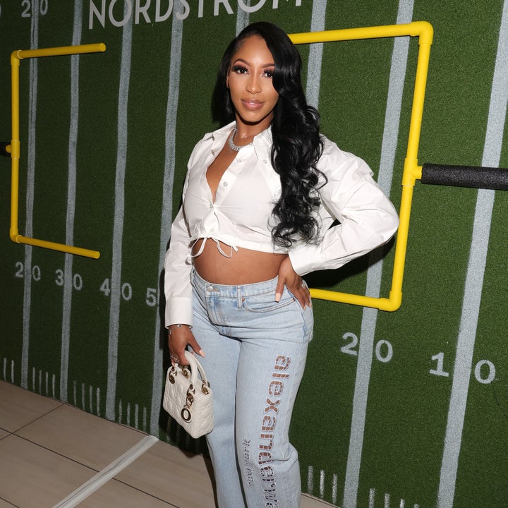 Chariah Gordon in a cropped top and jeans at a Nordstrom event