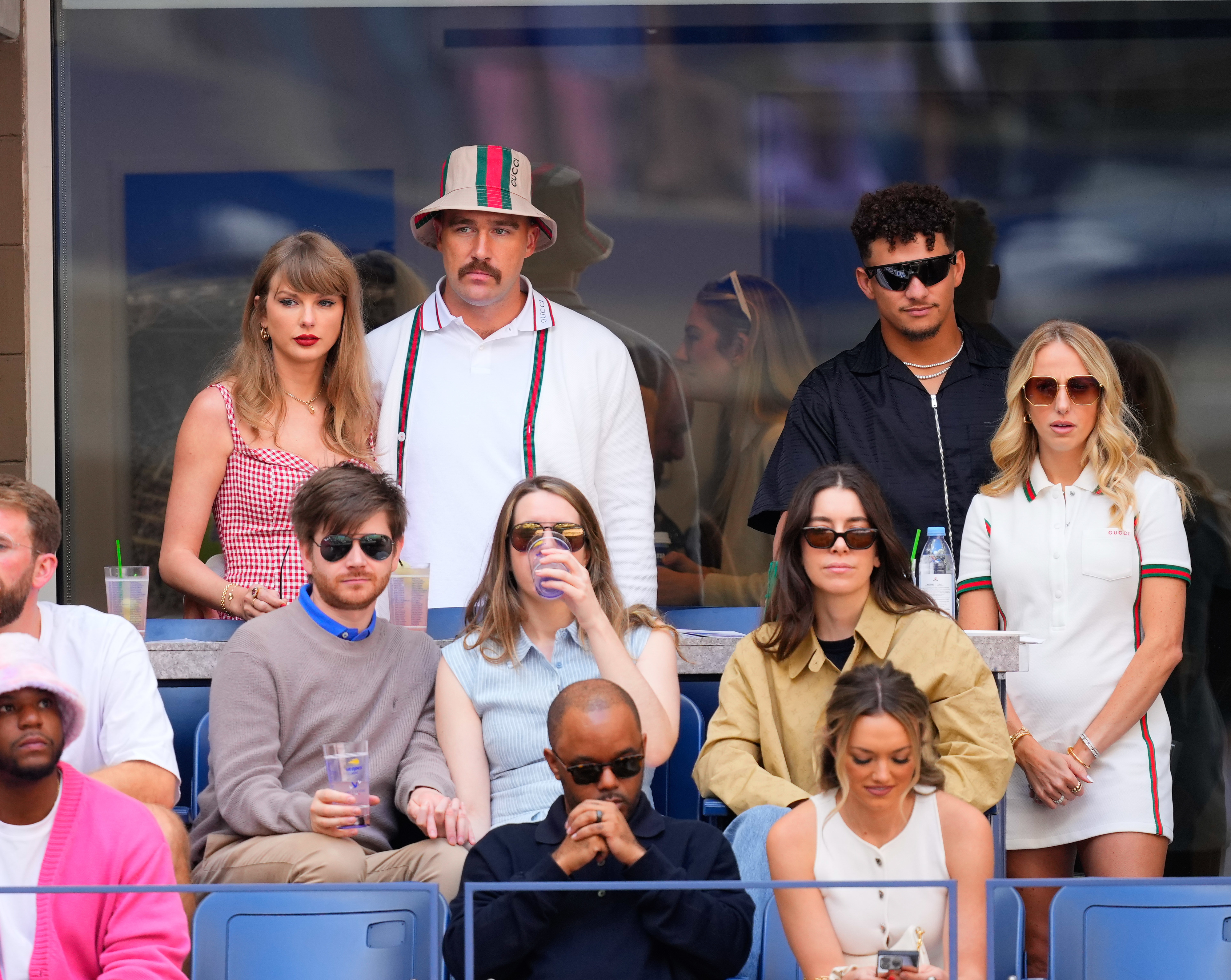 Taylor Swift and Travis Kelce watch a game with Patrick and Brittany Mahomes from the stands