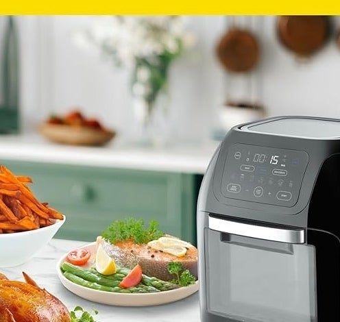 Chefman air fryer with cooked chicken, vegetables, and fries in a kitchen setting. Text reads: &quot;Healthy Meals in Minutes.&quot;