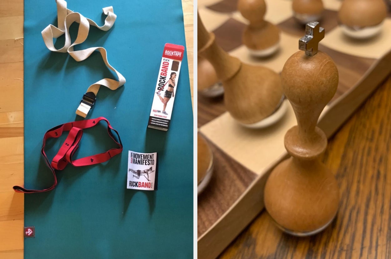 Yoga mat with resistance bands and a chessboard with pawns on a wooden table