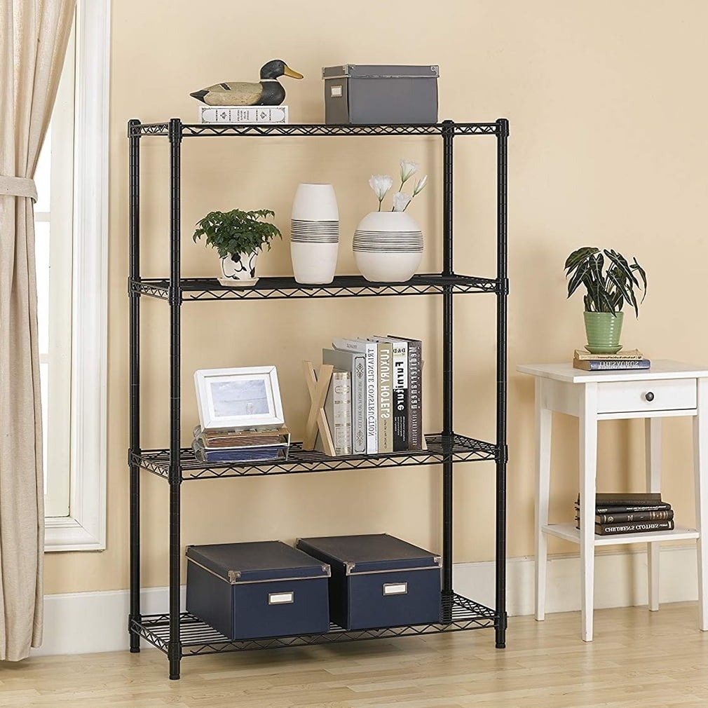 Metal wire bookshelf with decorative items, books, and storage boxes