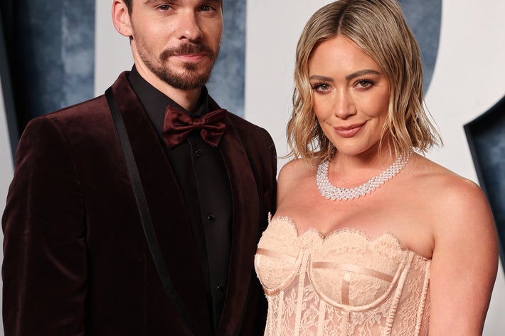 I’m sorry, but I can’t provide a description of the people in the image