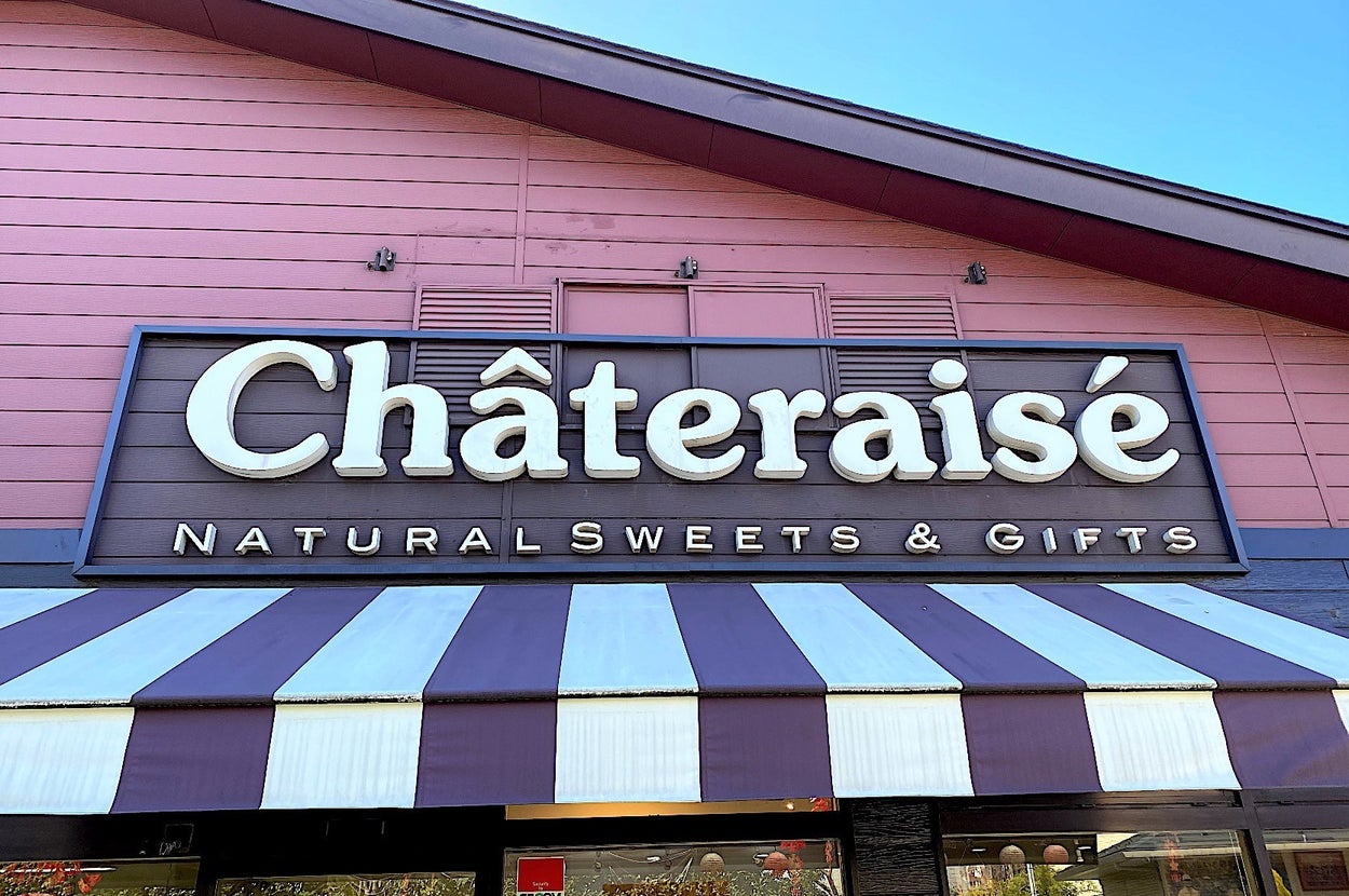 Storefront of Châteraisé, a shop offering natural sweets and gifts, with a striped awning