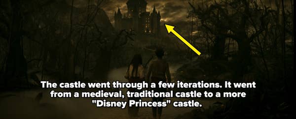 Two people walk towards a dark, eerie castle through a spooky, foggy forest