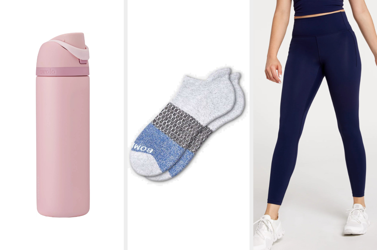 Pink water bottle, pair of blue and gray socks, and someone wearing navy activewear leggings with white sneakers