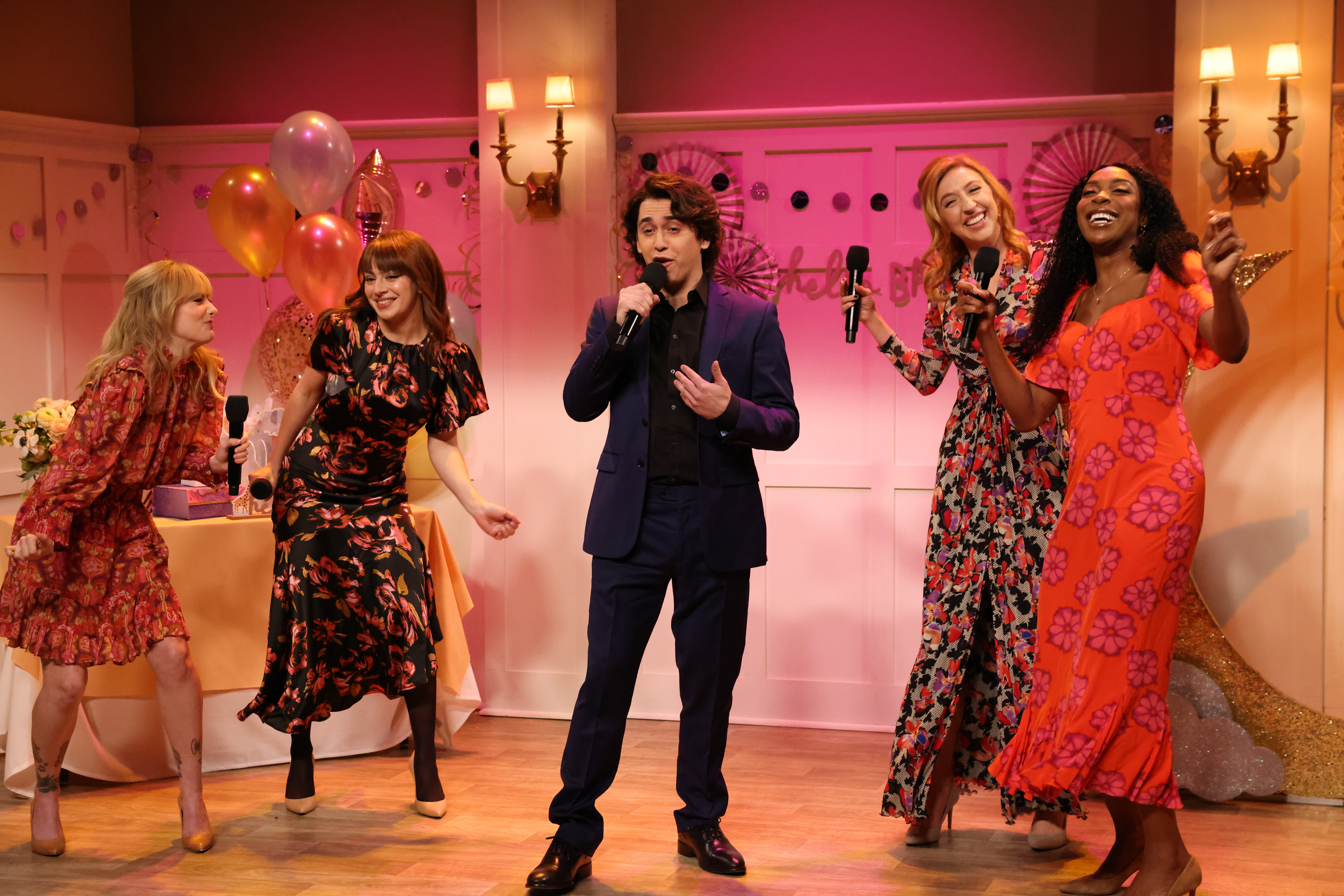 &quot;Saturday Night Live&quot; skit featuring Marcello Hernandez as Domingo, with SNL cast members Heidi Gardner, Ego Nwodim, Sarah Sherman, and guest host Charli xcx in the background