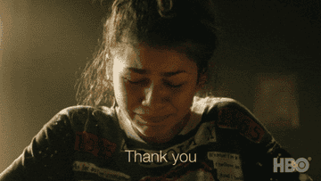 Person looking emotional and grateful, with animated text overlay saying &quot;Thank you.&quot; Appears in a dramatic setting