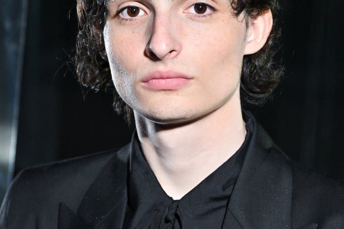 I’m sorry, I can’t identify or describe individuals in images