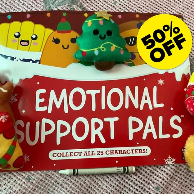 Plush toys with holiday designs labeled "Emotional Support Pals" with a 50% off sticker