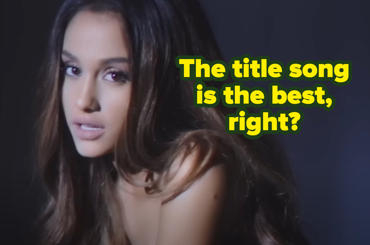 Person posing with side-swept hair and neutral expression. Text: "The title song is the best, right?"