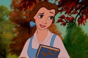 Animated character with a book, looking thoughtful, standing outdoors with fall leaves in the background