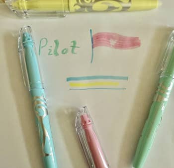 Assorted pastel pens connected paper, with handwritten