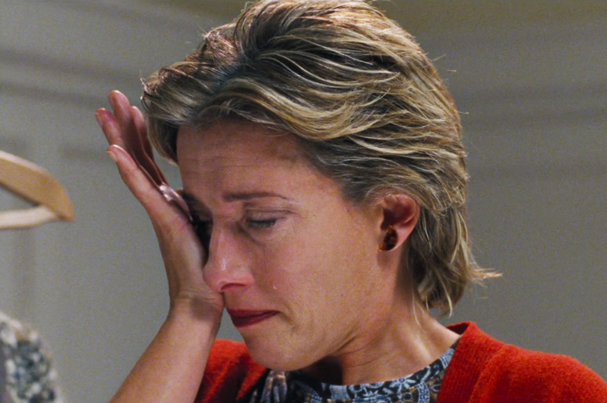 Emma Thompson wiping away tears as Karen in Love Actually