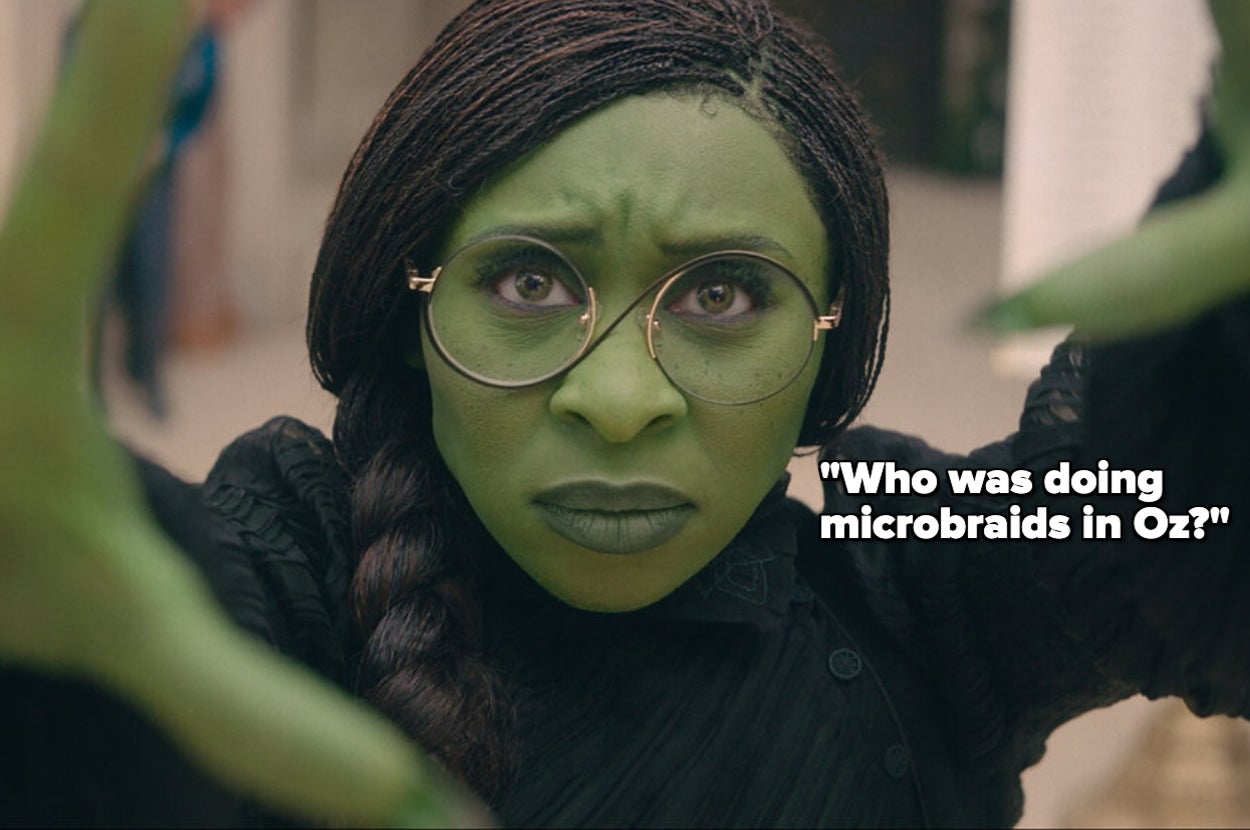 Person with green makeup and microbraids wearing glasses, captioned with "Who was doing microbraids in Oz?"