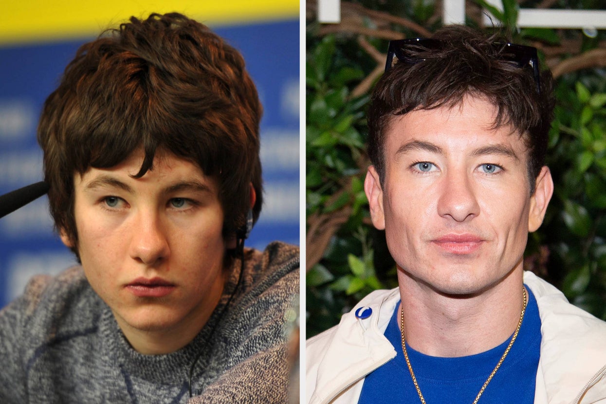 Barry Keoghan sits casually on a sofa, wearing a light-colored sweater and jeans, with plants in the background