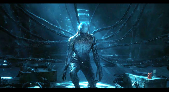 Mysterious Vecna with vine-like extensions emerges in a dimly lit scene