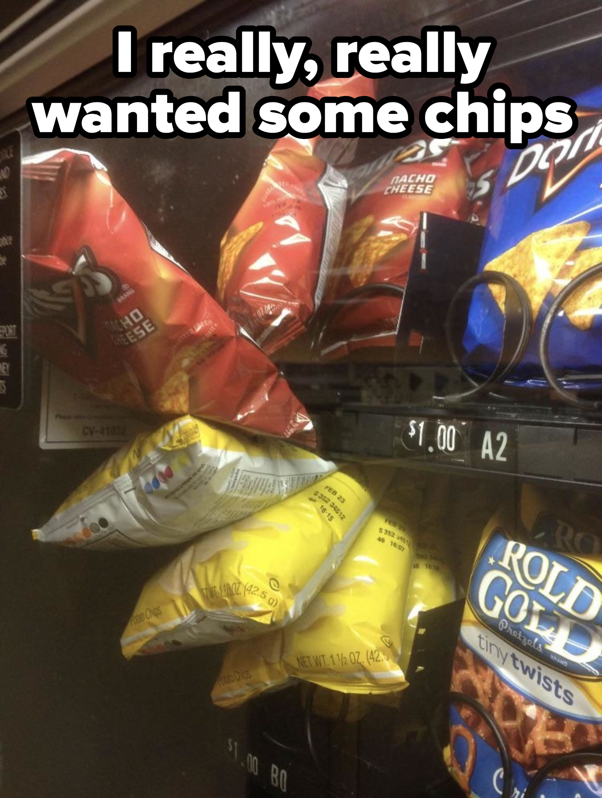 Bags of chips stuck in a vending machine, including nacho cheese and sour cream flavors, with others stacked behind, stuck at $1 each