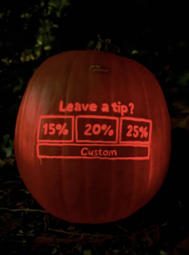 Pumpkin carved with a digital tip screen showing options: 15%, 20%, 25%, and custom