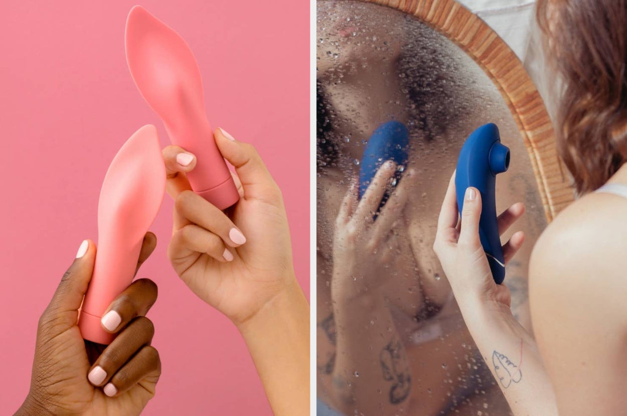Two hands holding pink flame-shaped clitoral vibrators and model looking at reflection in wet mirror while holding blue clitoral vibrator