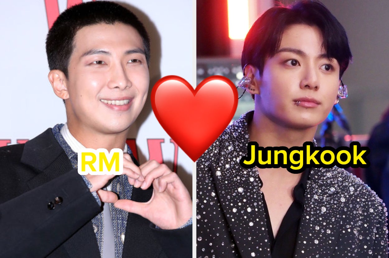 Two individuals create a heart sign with a red heart emoji between them. Text labels them as RM and Jungkook