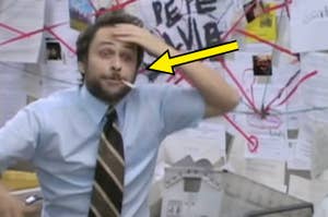 Person in office, disheveled, gesturing at conspiracy board with red strings connecting papers, appearing stressed