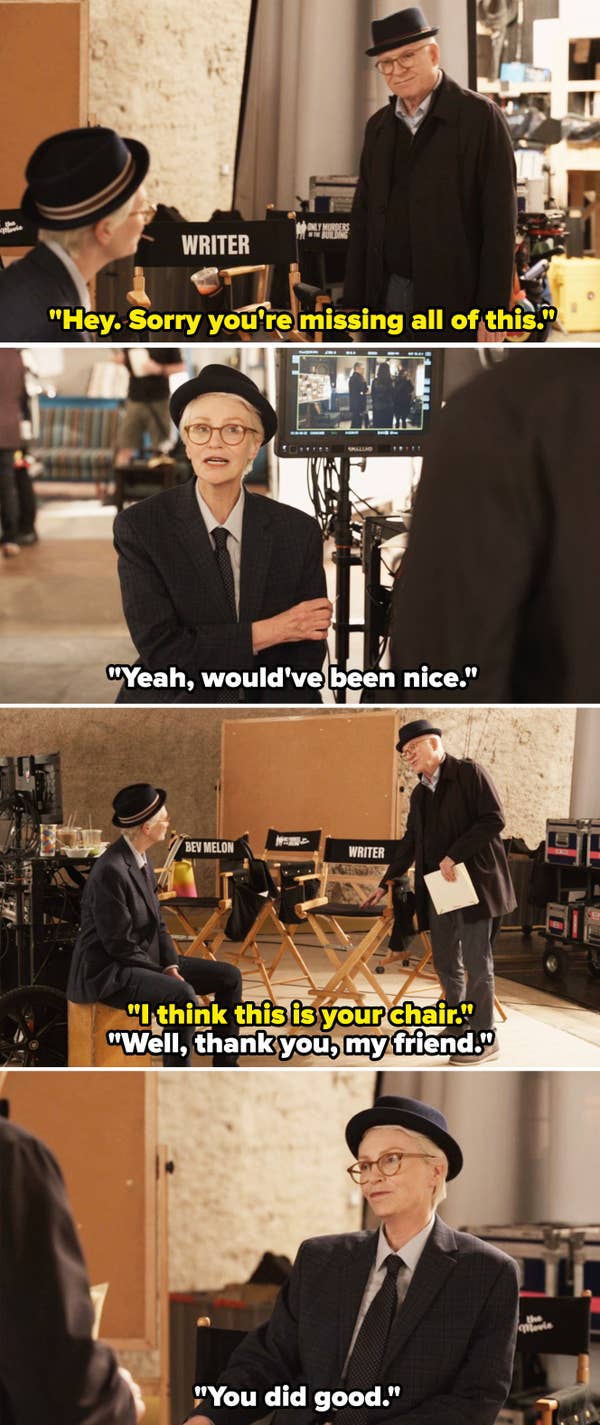 A man in a suit and hat is offered a chair labeled &quot;WRITER&quot; on a film set. Another man praises his successful work