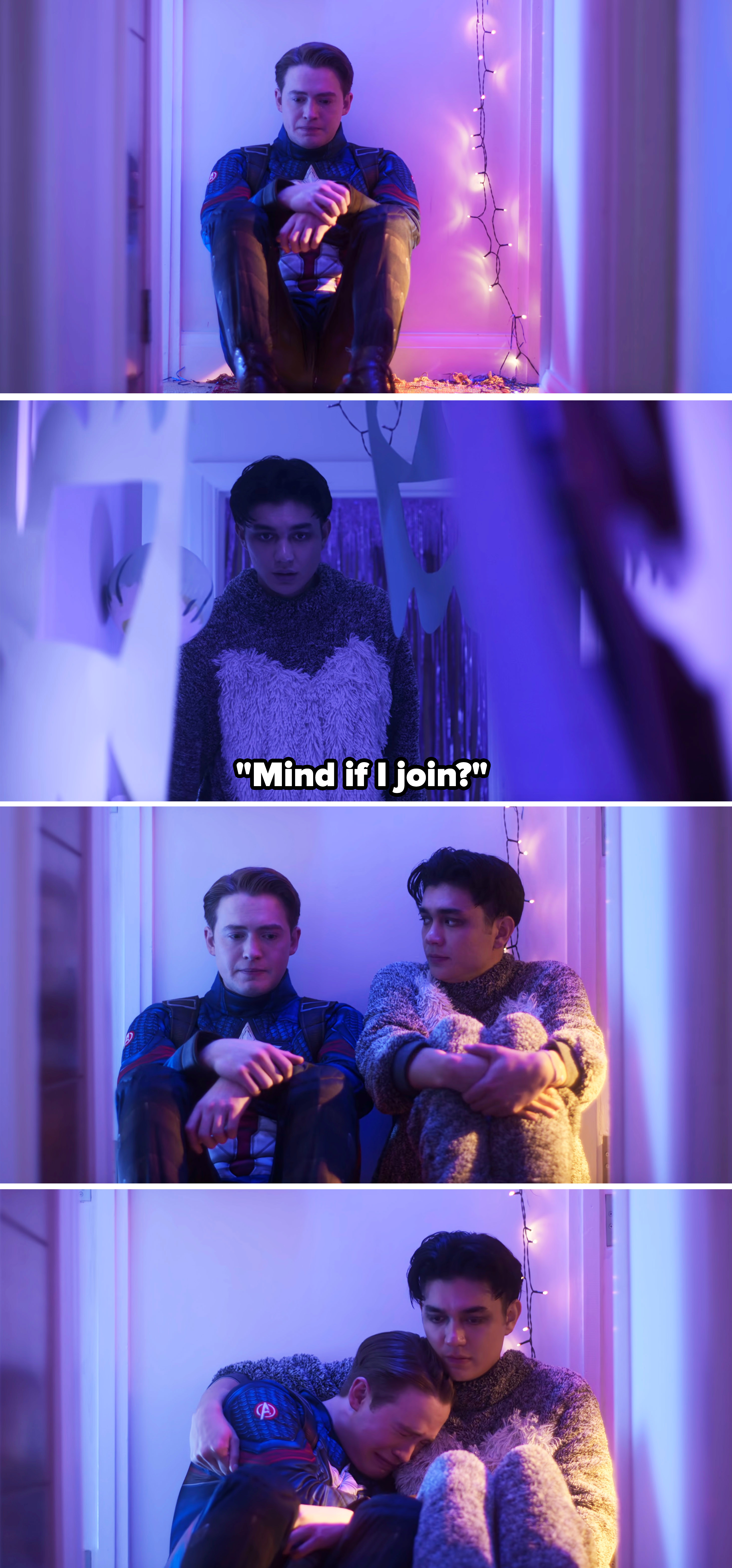 Four images of friends sitting in a hallway, comforting each other. The first person wears a blue jacket; the second person wears a fuzzy sweater