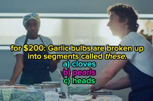 Two people in a kitchen discussing a question: "For $200: Garlic bulbs are broken up into segments called these." Options: a) cloves b) pearls c) heads