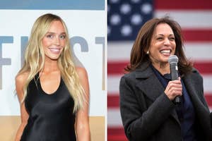 Two women smiling; left is in a sleek black dress, right is holding a microphone, wearing a dark coat in front of a U.S. flag backdrop