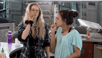 sarah pretends to smoke a doobie