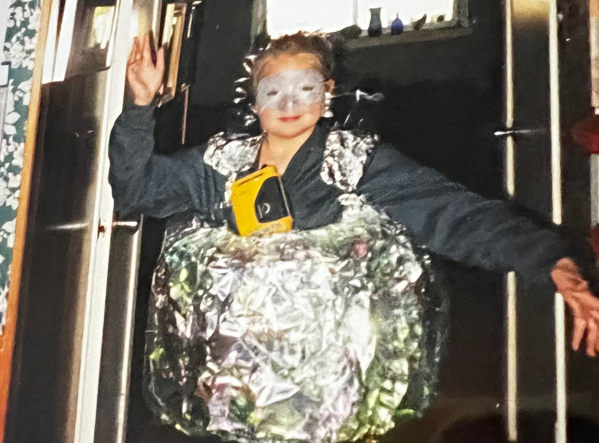 young sarah in a disco ball costume