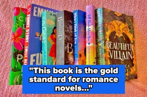 A collection of romance novels is displayed with the quote, "This book is the gold standard for romance novels..."