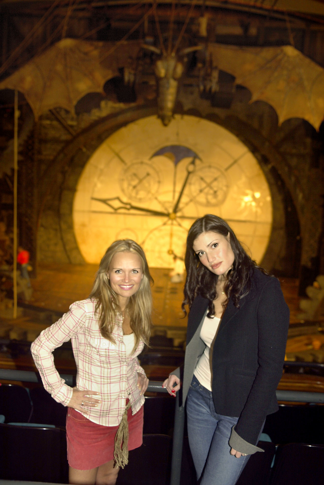 Kristin Chenoweth and Idina Menzel standing in front of the Wicked stage in San Francisco