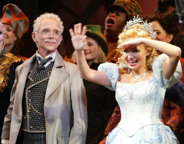 Kristin Chenoweth and Joel Grey celebrating on stage during a Wicked curtain call