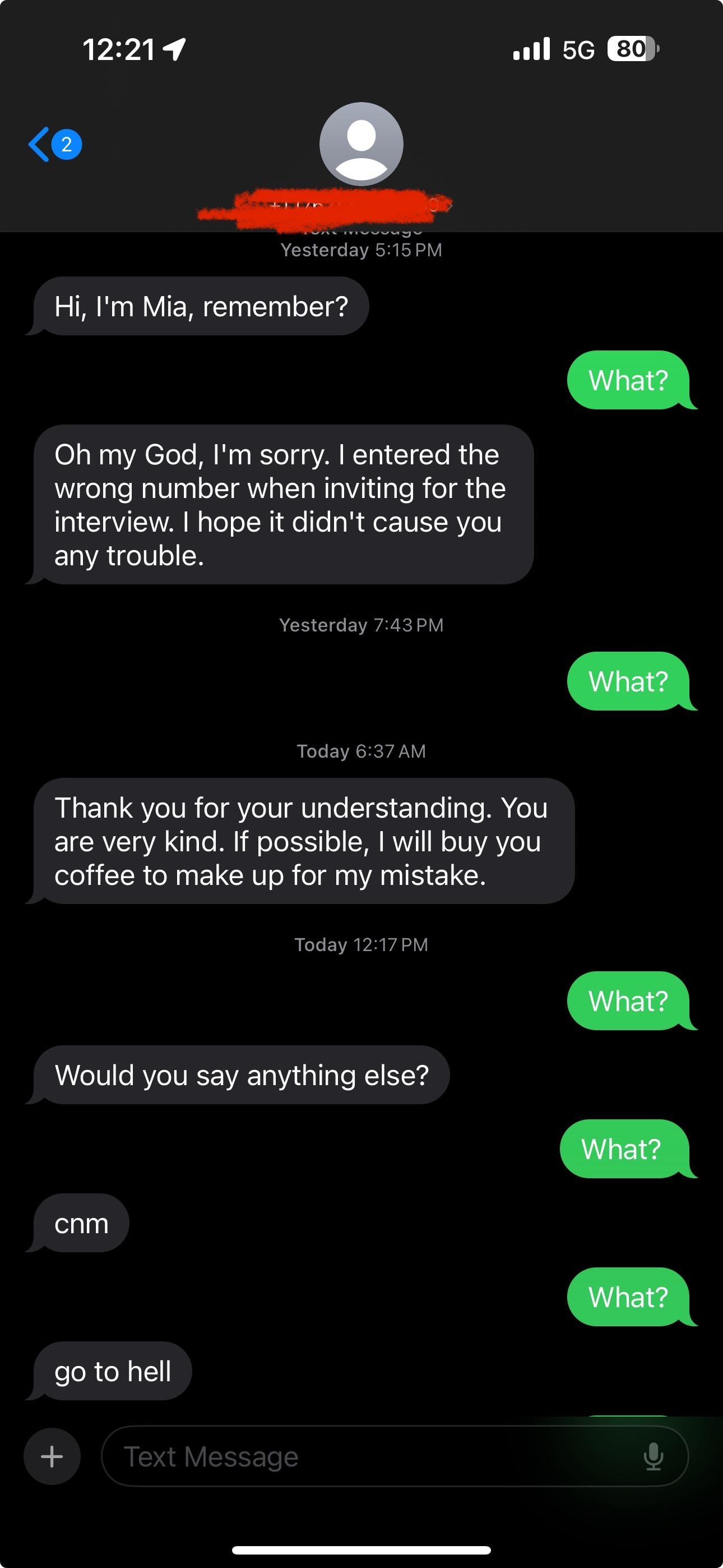 A series of text messages where one person apologizes for inviting the wrong number to an interview, while the recipient only replies with "What?"