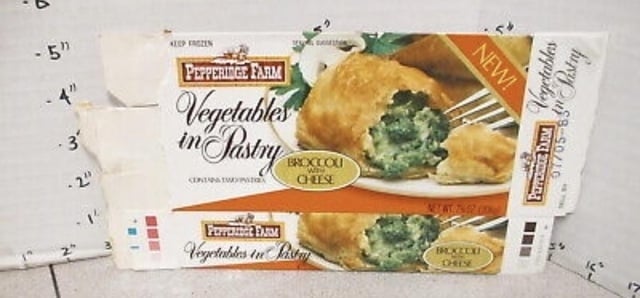 Pepperidge Farm Vegetables successful Pastry container with broccoli and food filling, photographed adjacent to a measuring portion for scale