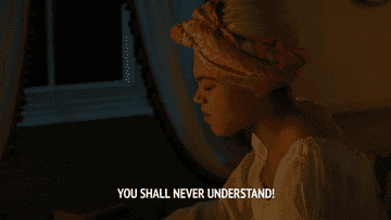 Person with headwrap dramatically says, &quot;You shall never understand!&quot; in a dimly lit room