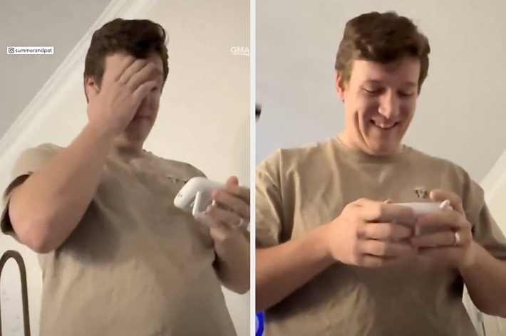 男性がスマートフォンを見ながら驚き、次に微笑んでいます。