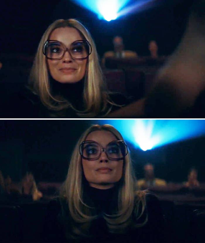 Margot Robbie as Sharon Tate watching a movie in a theater in "Once Upon a Time in Hollywood"