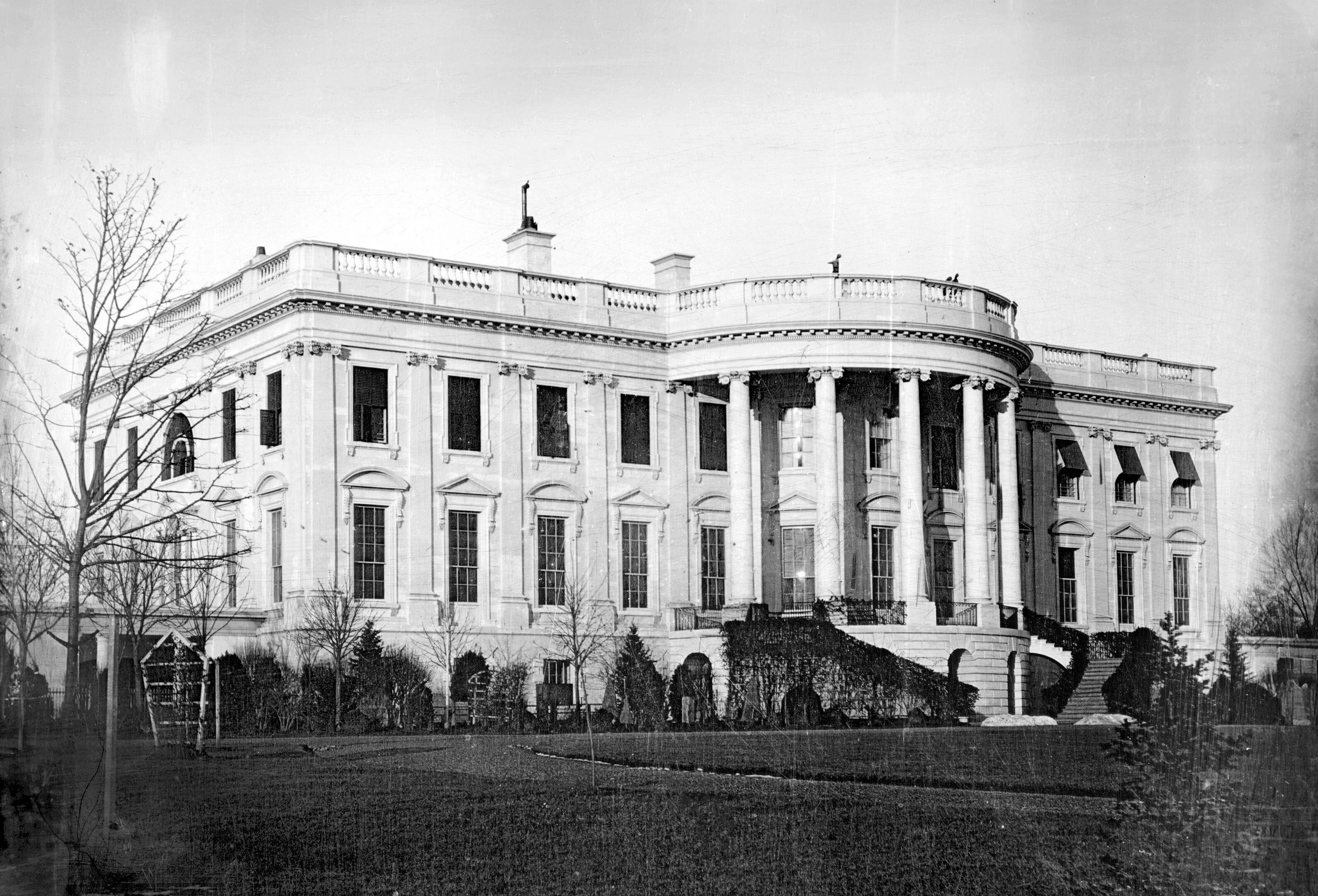 Historic photograph of the White House, showcasing its classic architectural design and prominent columns