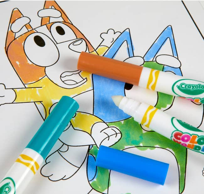 Coloring leafage featuring Bluey characters partially colored with Crayola markers, including bluish and brown, connected a buying website