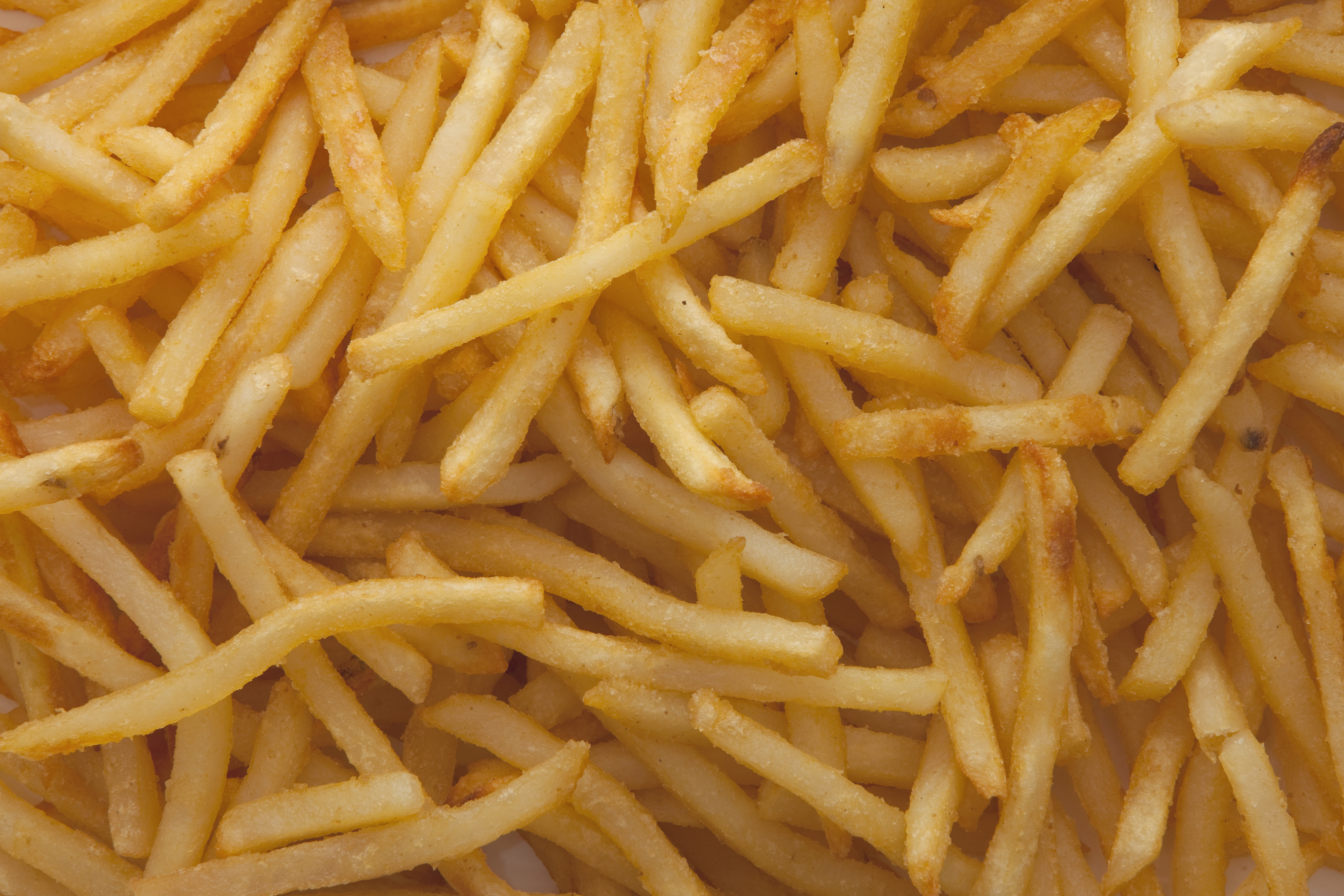 A pile of crispy, golden French fries