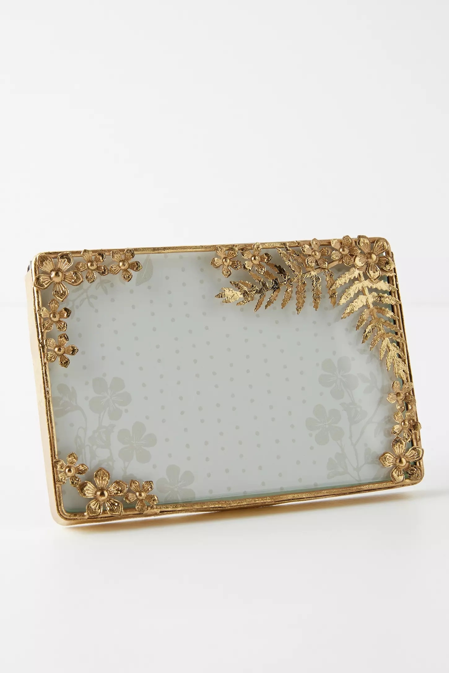 Decorative picture frame with floral and fern design on the edges, suitable for home decor or gifting