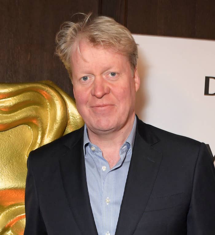 Charles Spencer wearing a dark blazer over a pinstripe shirt at a BAFTA event