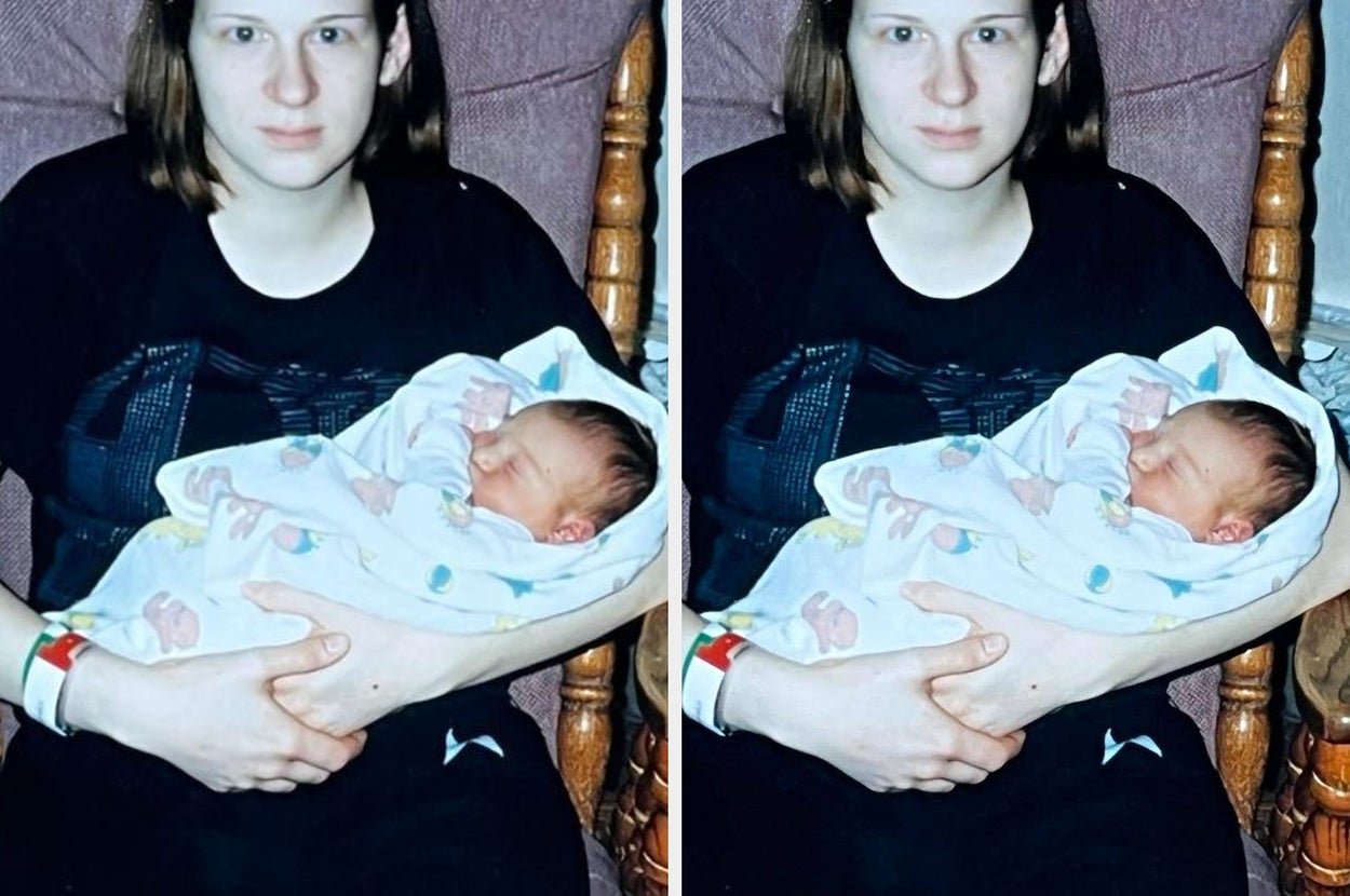 A woman sits in a chair holding a sleeping newborn wrapped in a patterned blanket