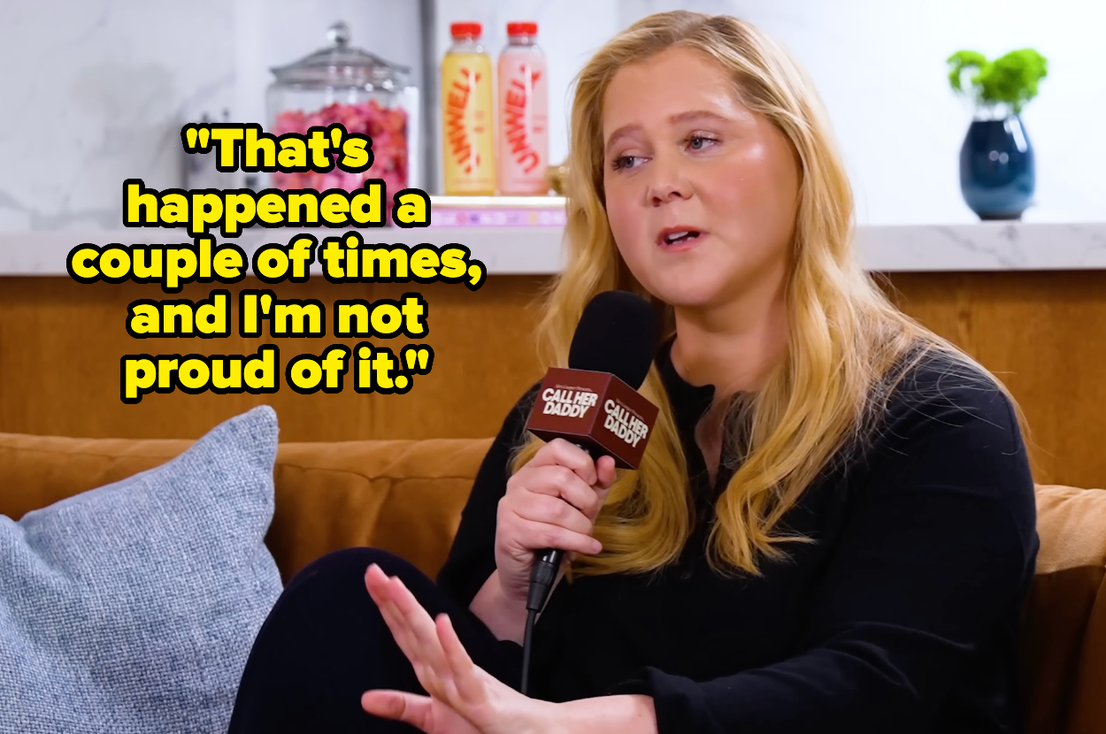 Person sitting on a couch during an interview, holding a microphone labeled "Call Her Daddy," with text: "That's happened a couple of times, and I'm not proud of it."