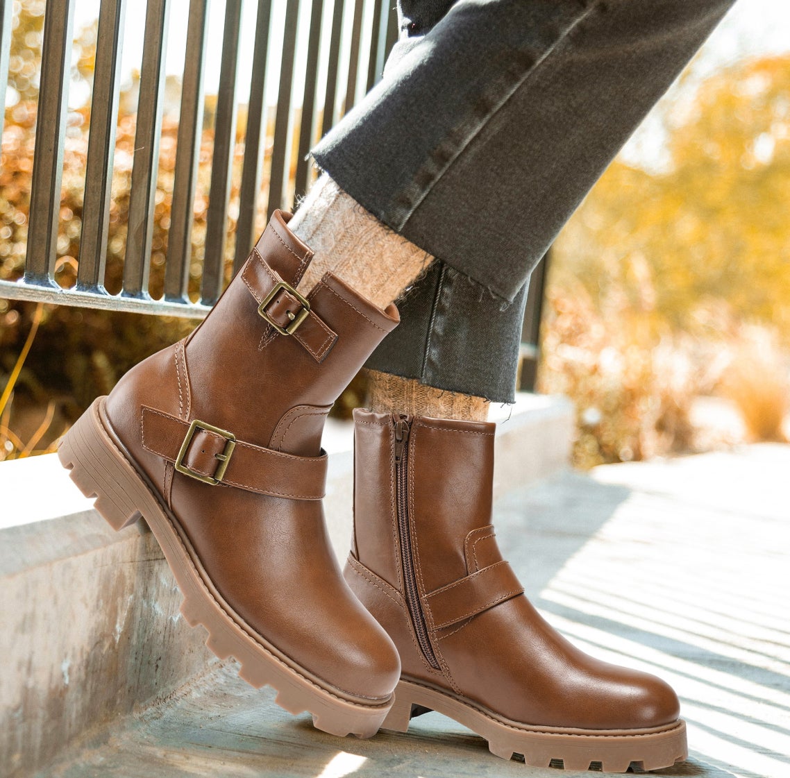 model wearing faux fur-lined ankle boots