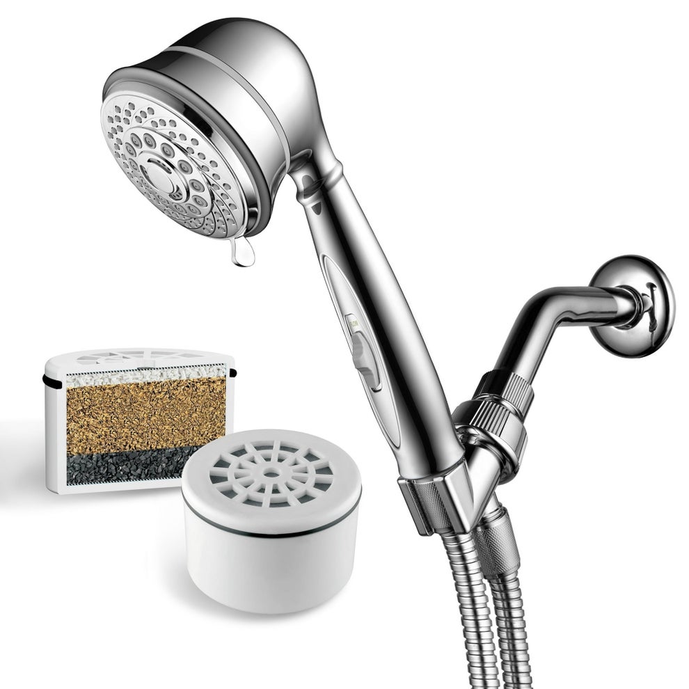 Showerhead with replaceable filter and attachment. Featured in a shopping article on bathroom essentials