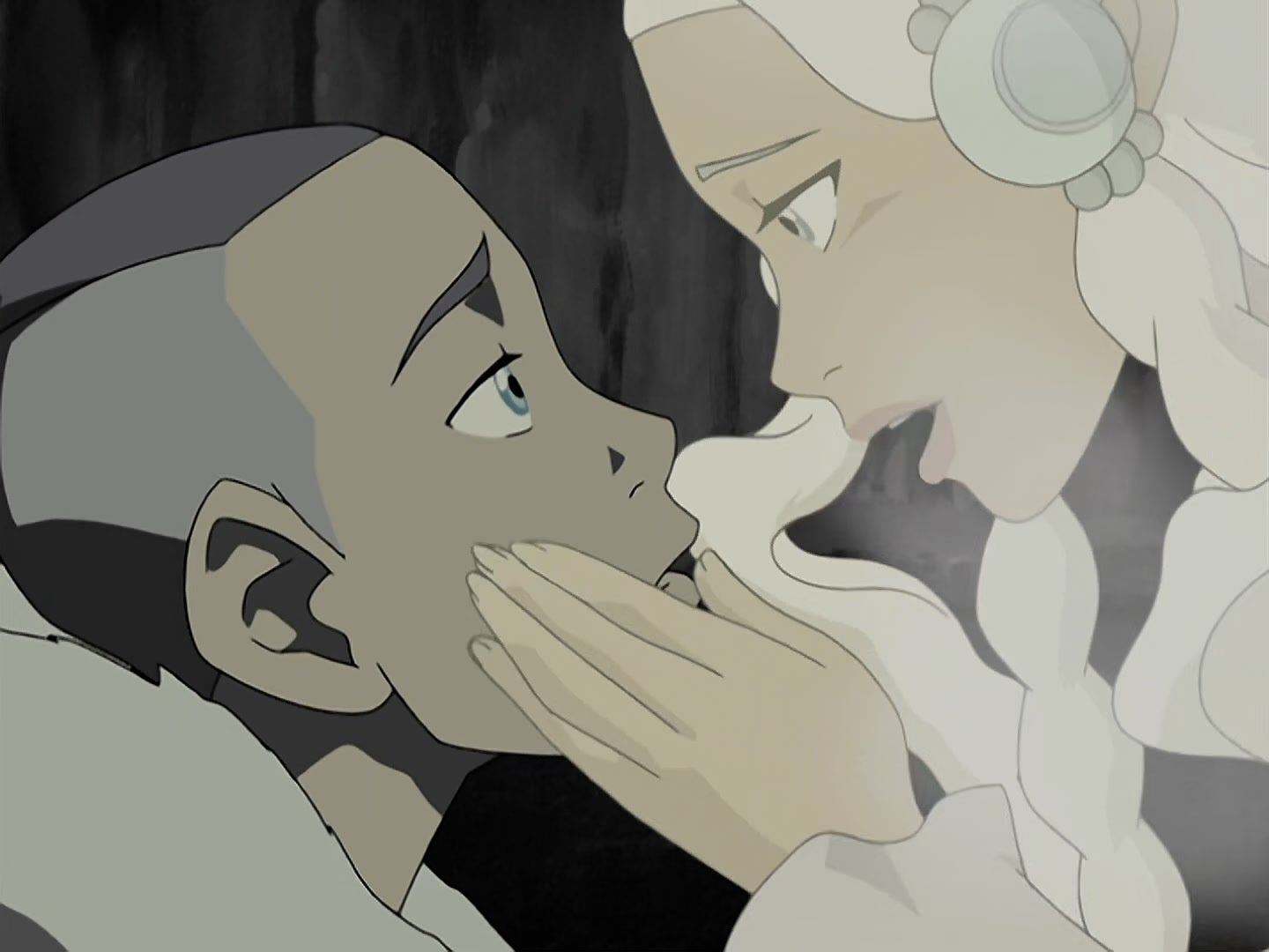 A tender moment between two animated characters with one gently touching the other's face, conveying deep emotion