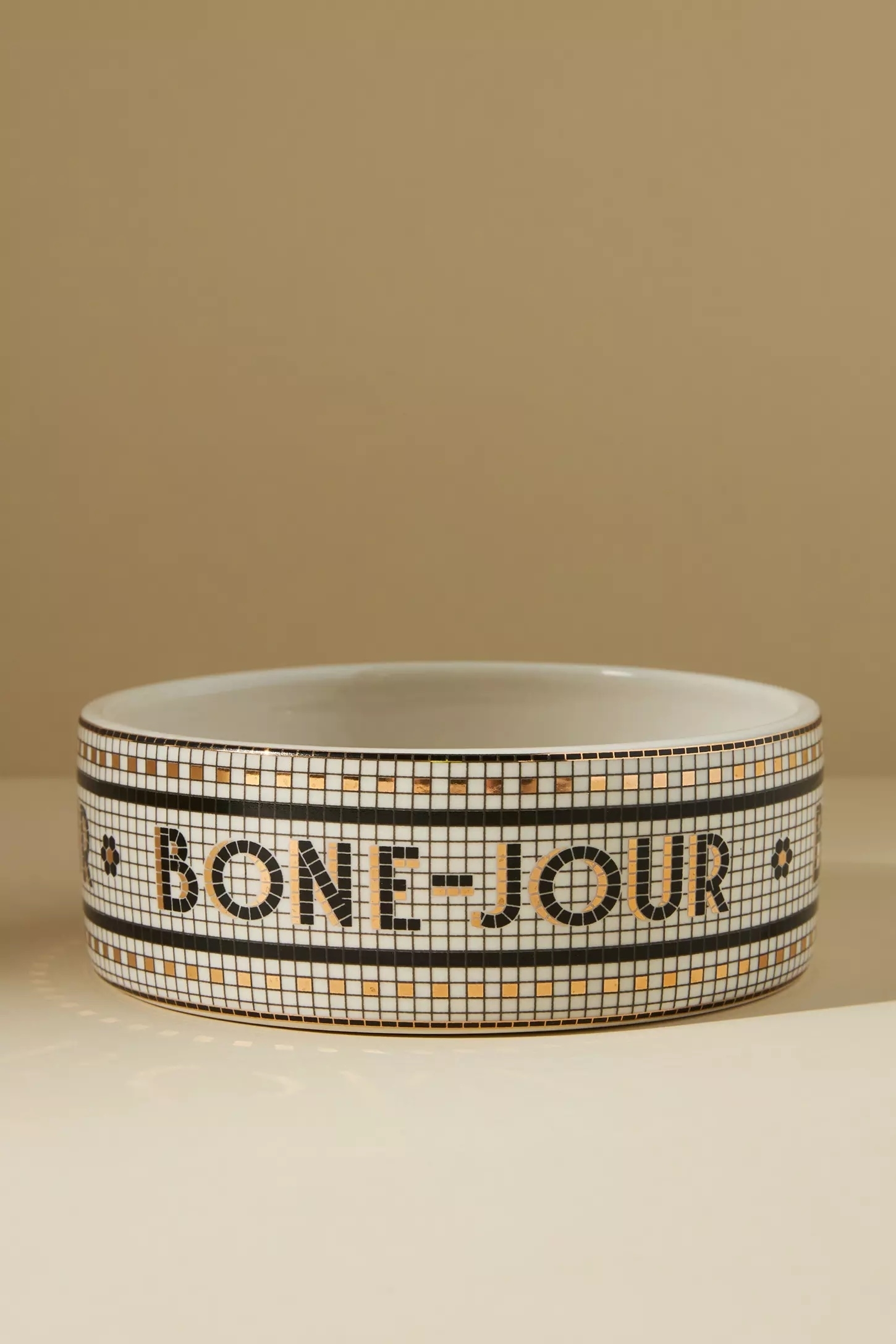 Pet bowl with mosaic design featuring the word &quot;Bone-Jour&quot; on the side, ideal for stylish pet dining